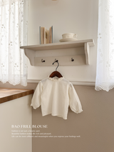 Bao frill blouse