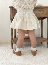 Eyelet suspender skirt