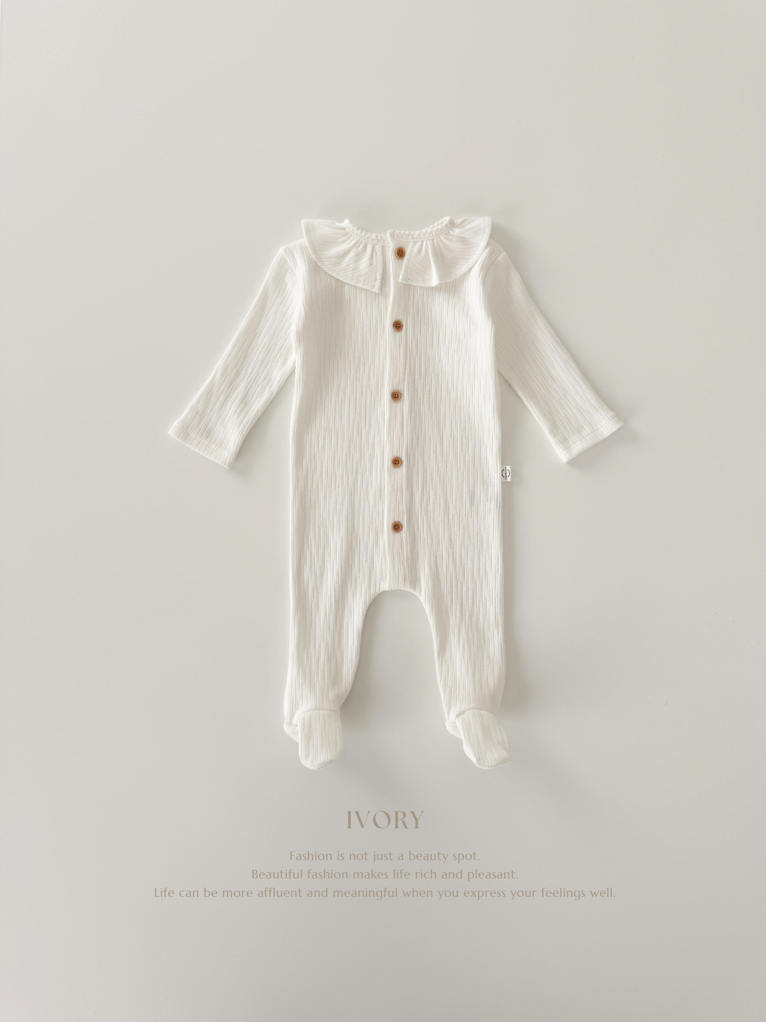 Keuri frill newborn suit