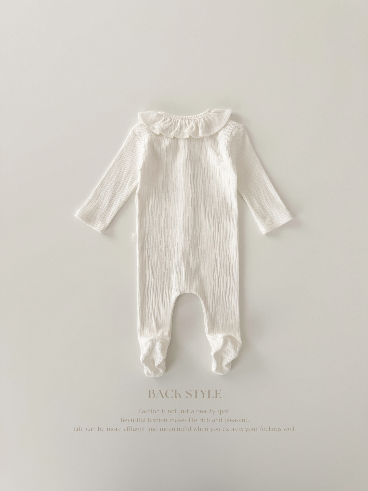 Keuri frill newborn suit