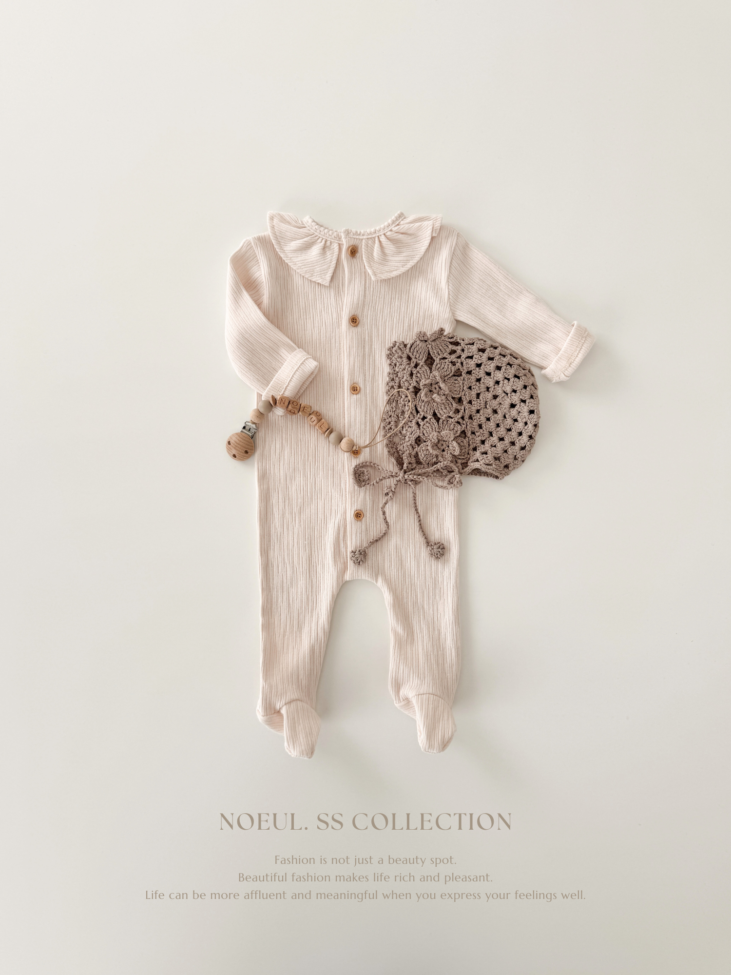 Keuri frill newborn suit