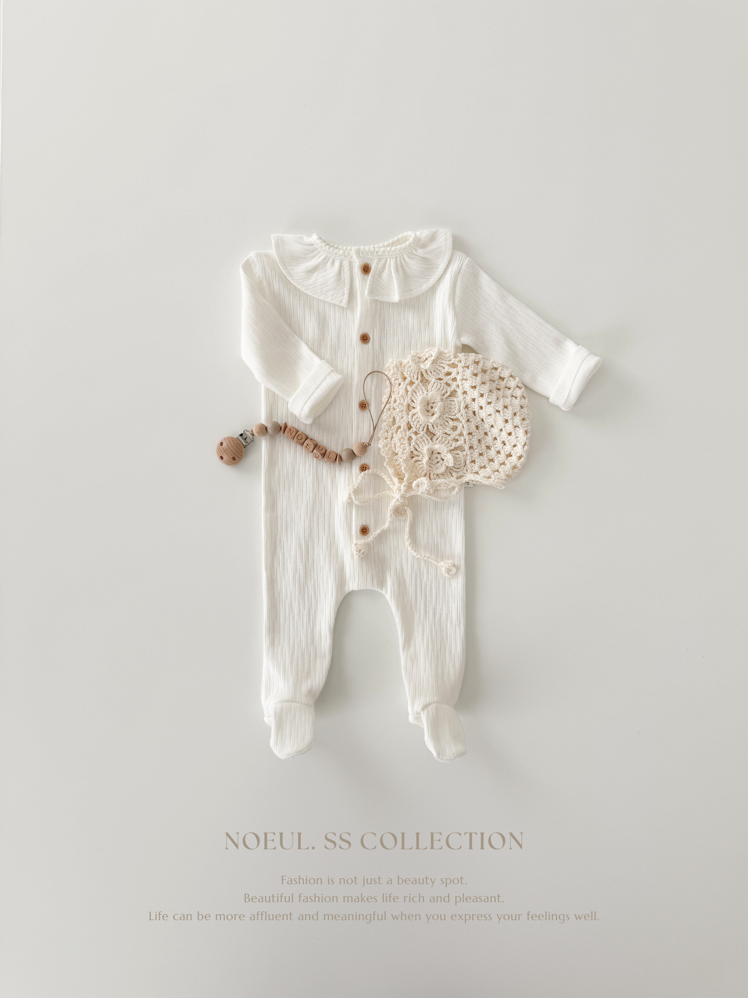 Keuri frill newborn suit