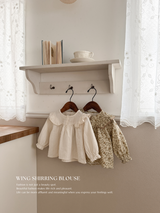 Wing shirring blouse