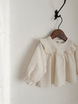 Wing shirring blouse