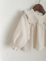 Wing shirring blouse