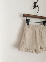 Corduroy frill pants