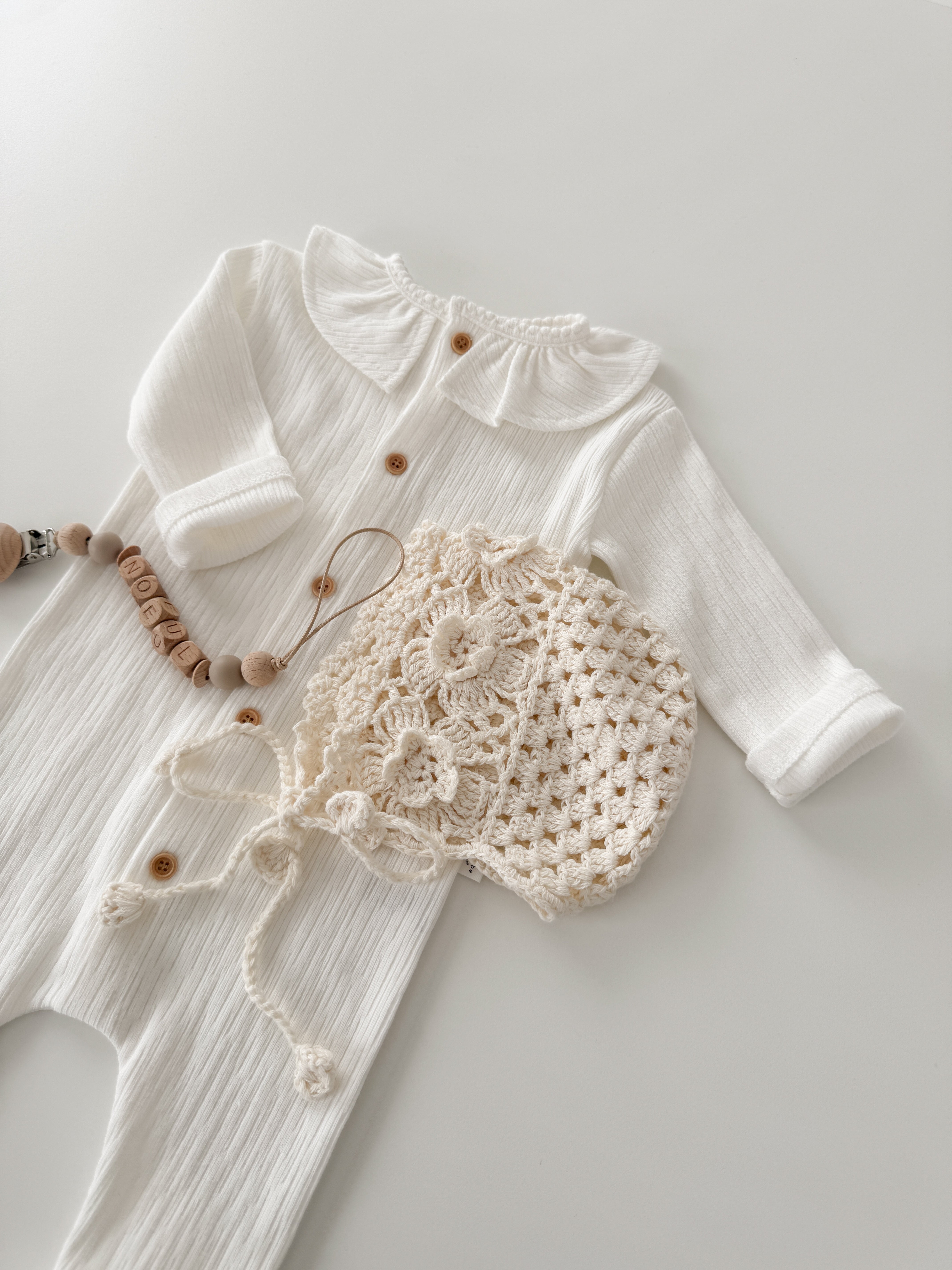 Keuri frill newborn suit