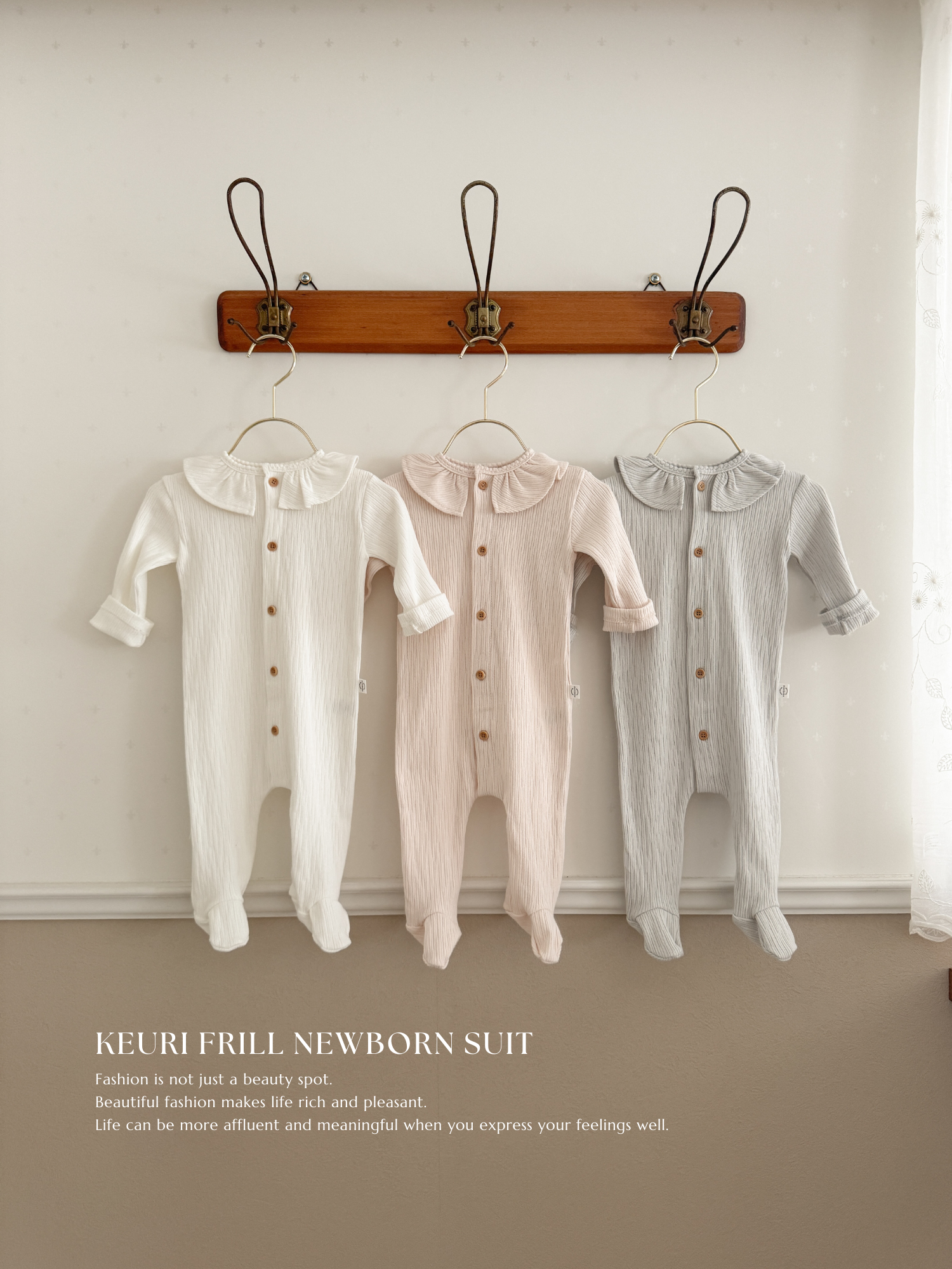 Keuri frill newborn suit
