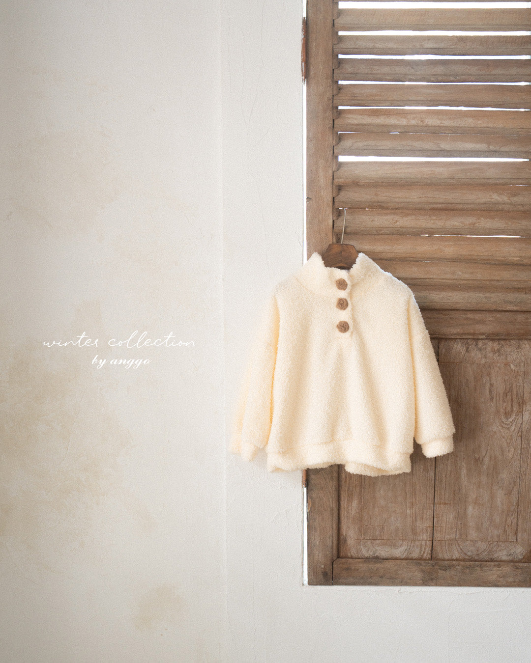 ［anggo］Cream button tops