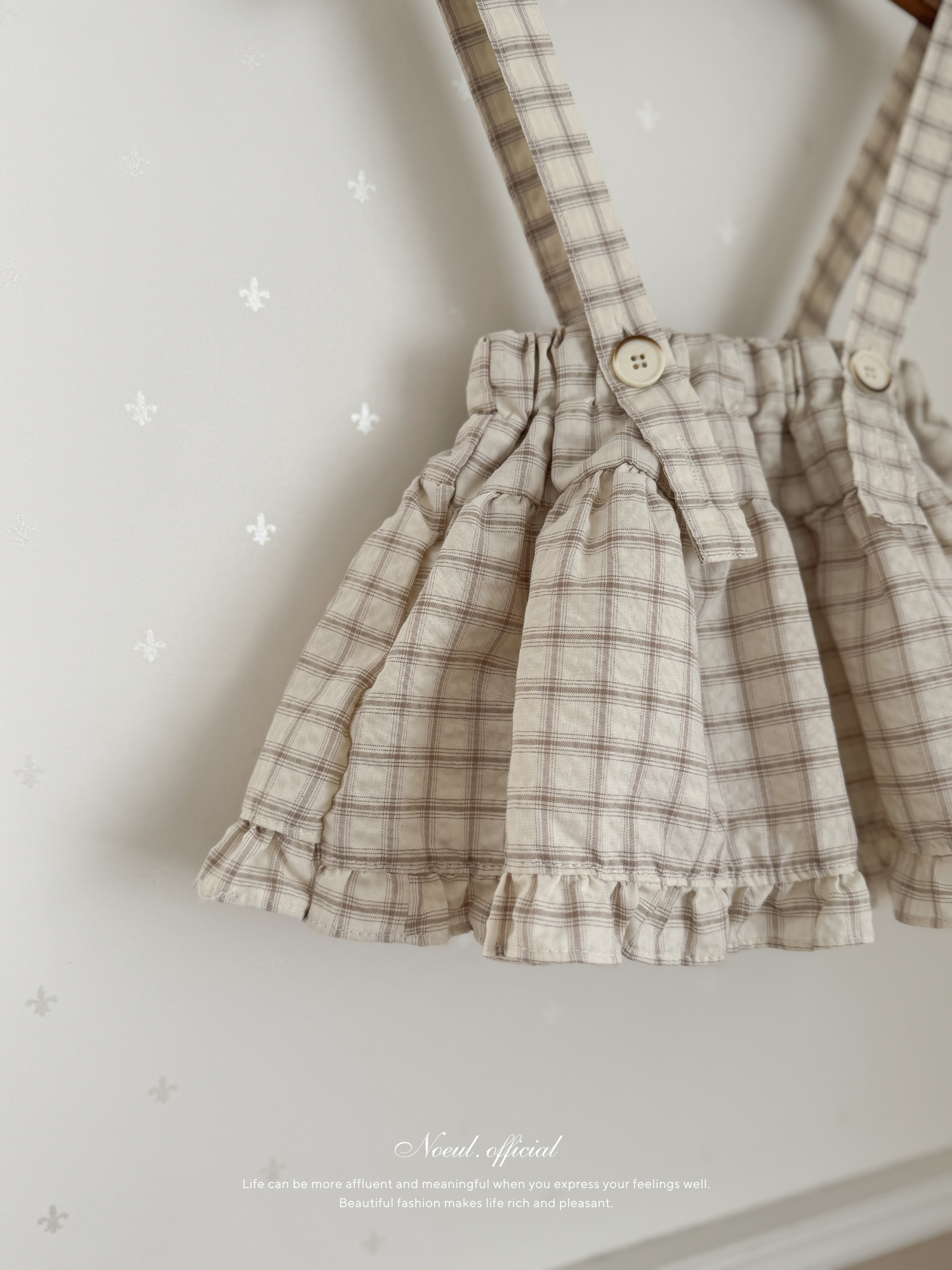 Pair check suspender skirt