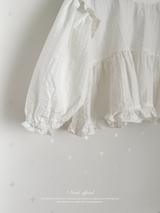 Shoulder frill blouse