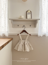 Pair check suspender skirt
