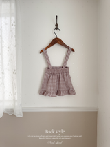 Daisy check suspender skirt