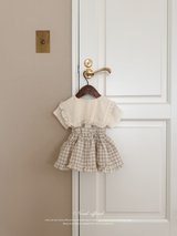 Pair check suspender skirt