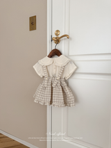 Pair check suspender skirt