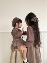 Manou smock rompers