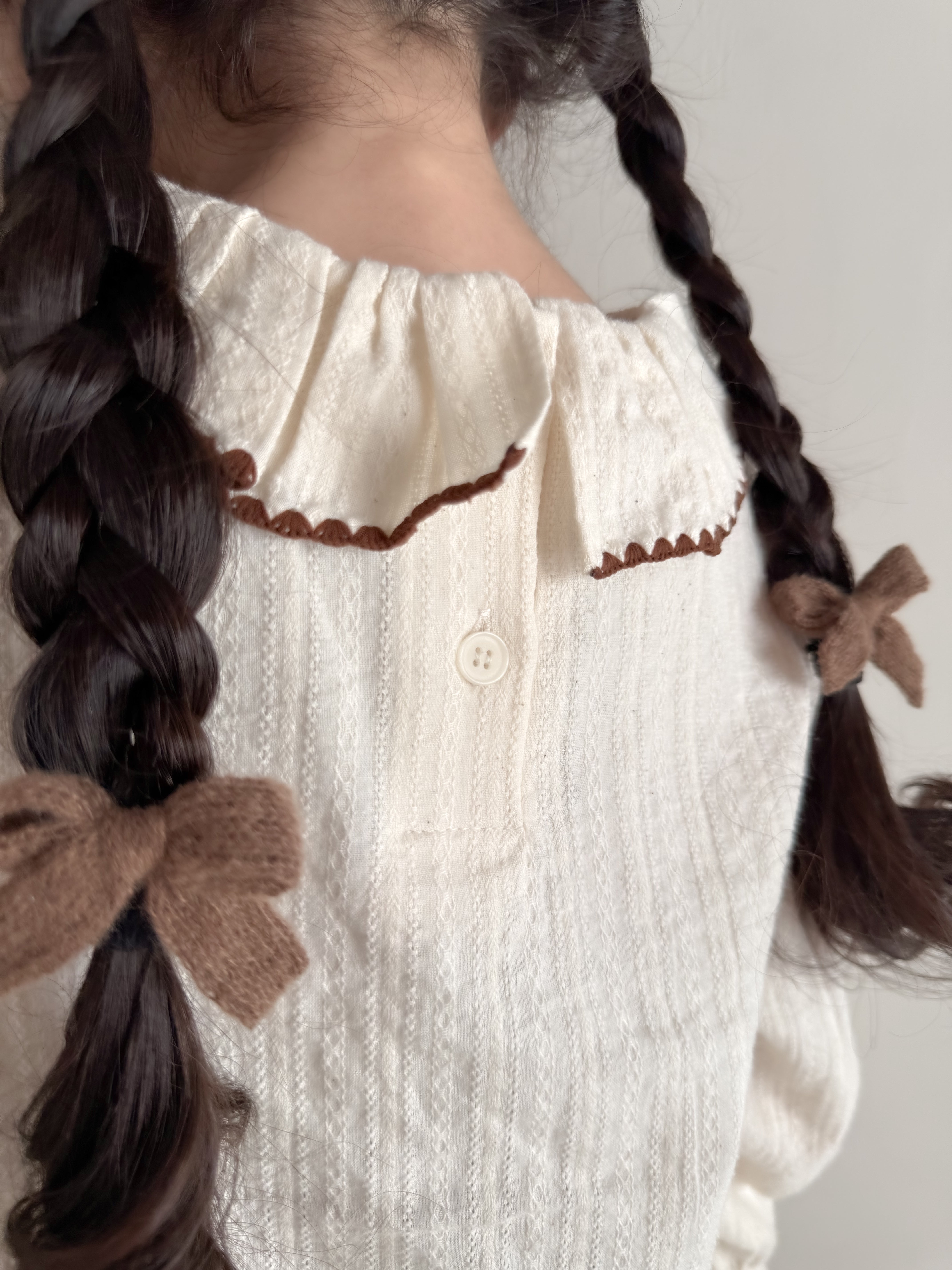 Tuck frill blouse