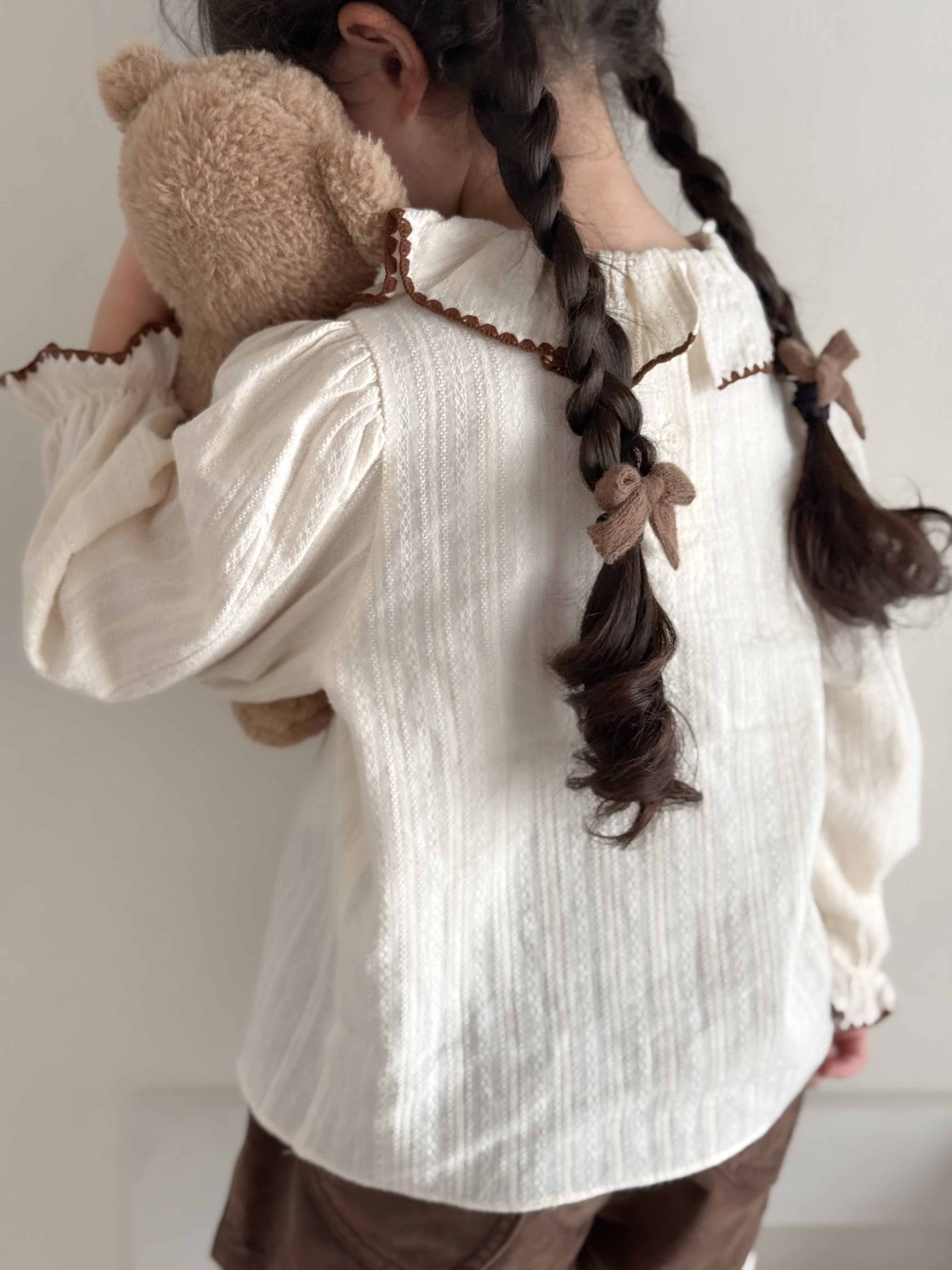 Tuck frill blouse