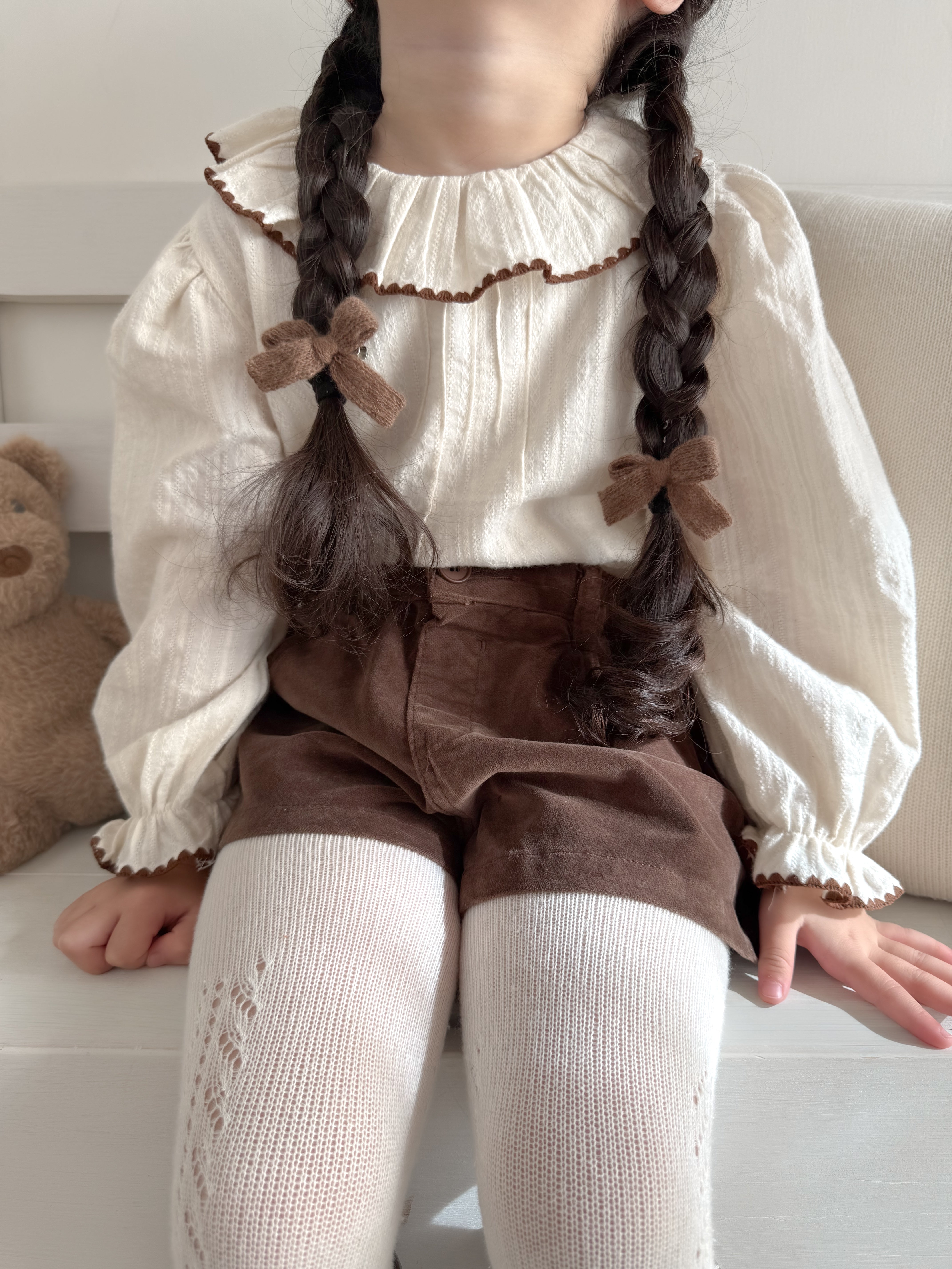 Tuck frill blouse