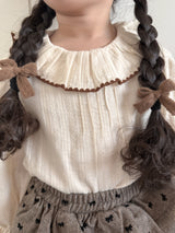 Tuck frill blouse
