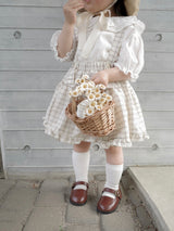 Pair check suspender skirt