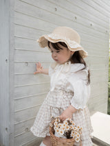 Pair check suspender skirt