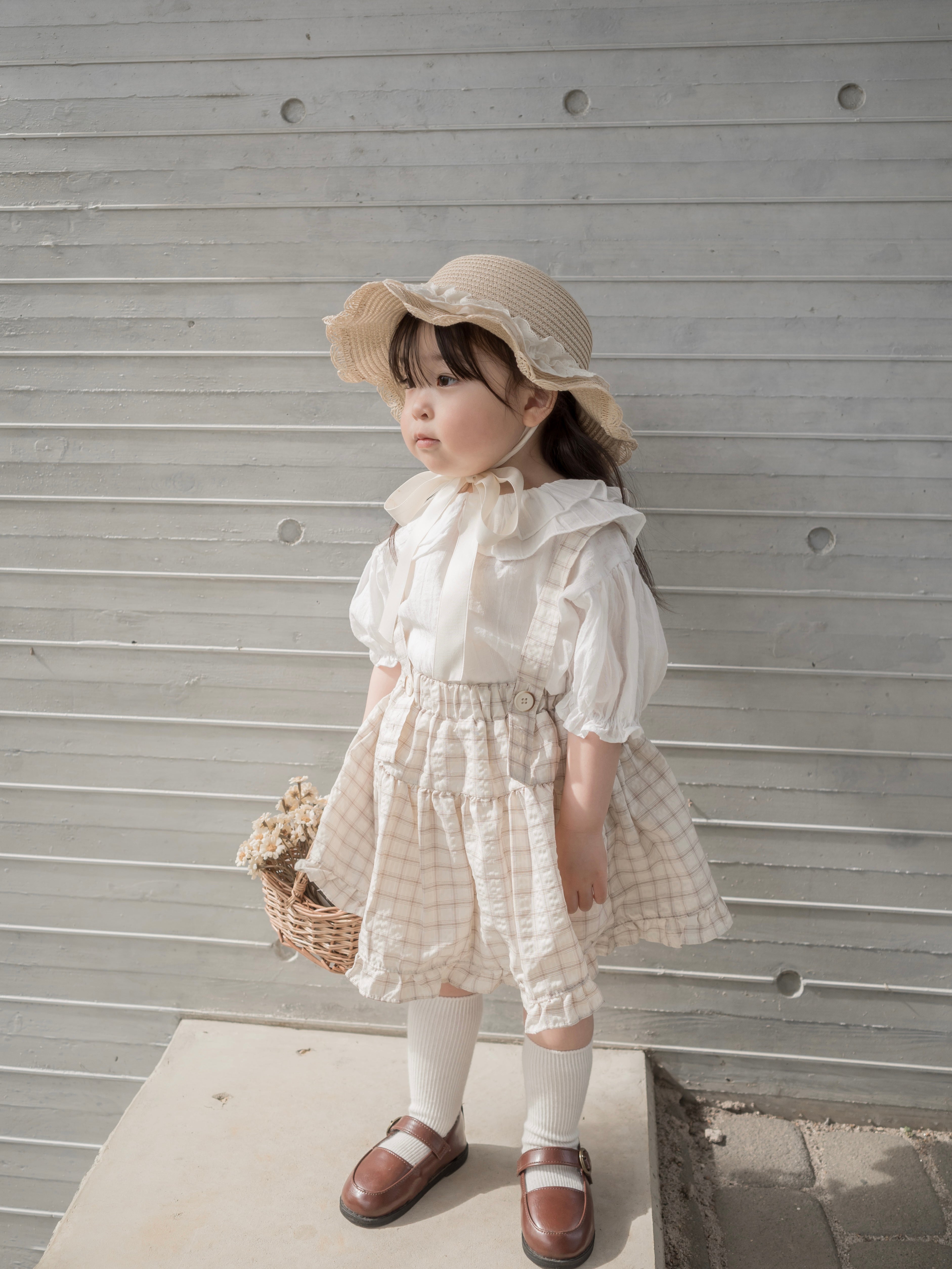 Pair check suspender skirt