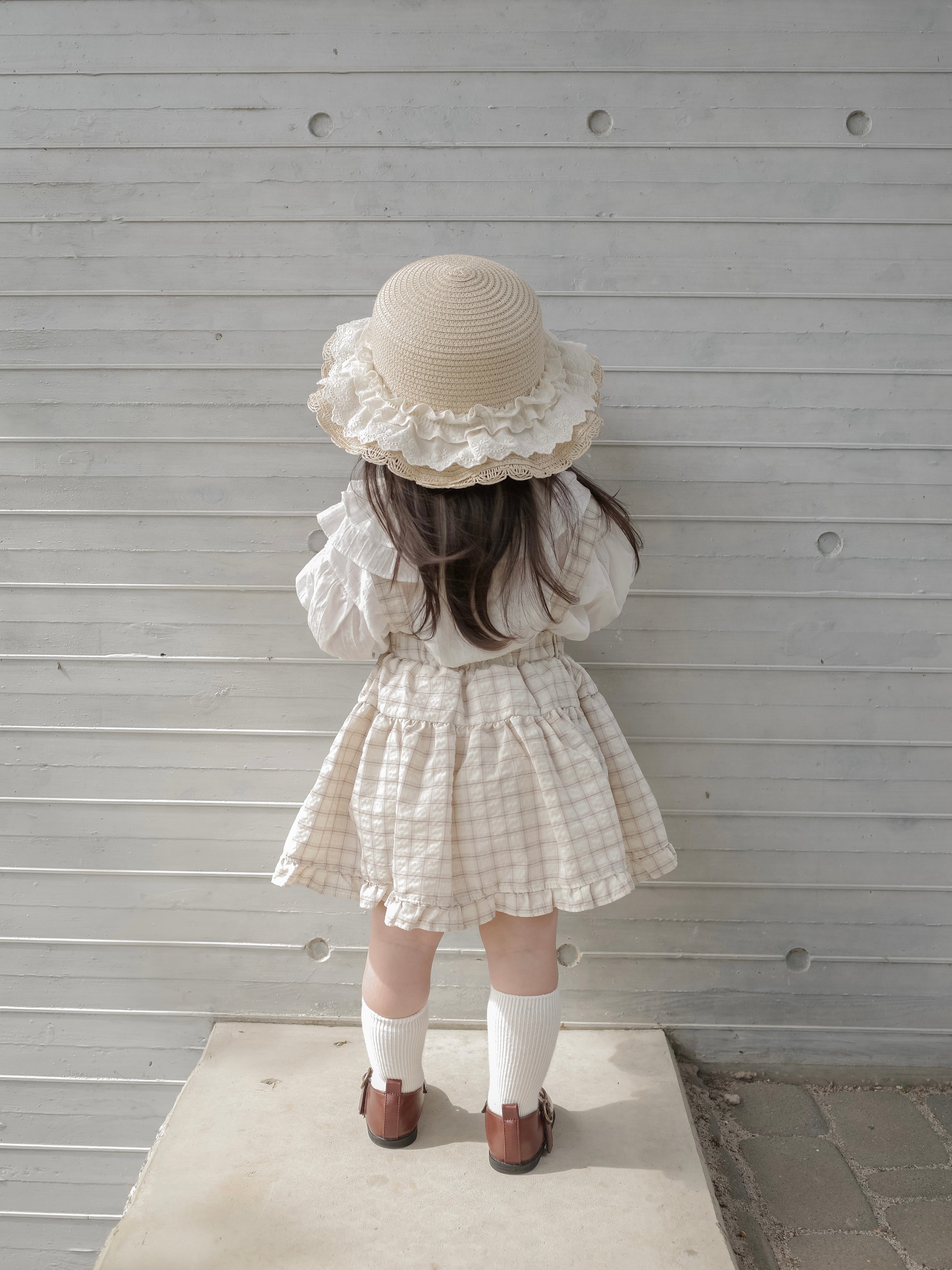 Pair check suspender skirt