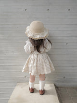 Pair check suspender skirt