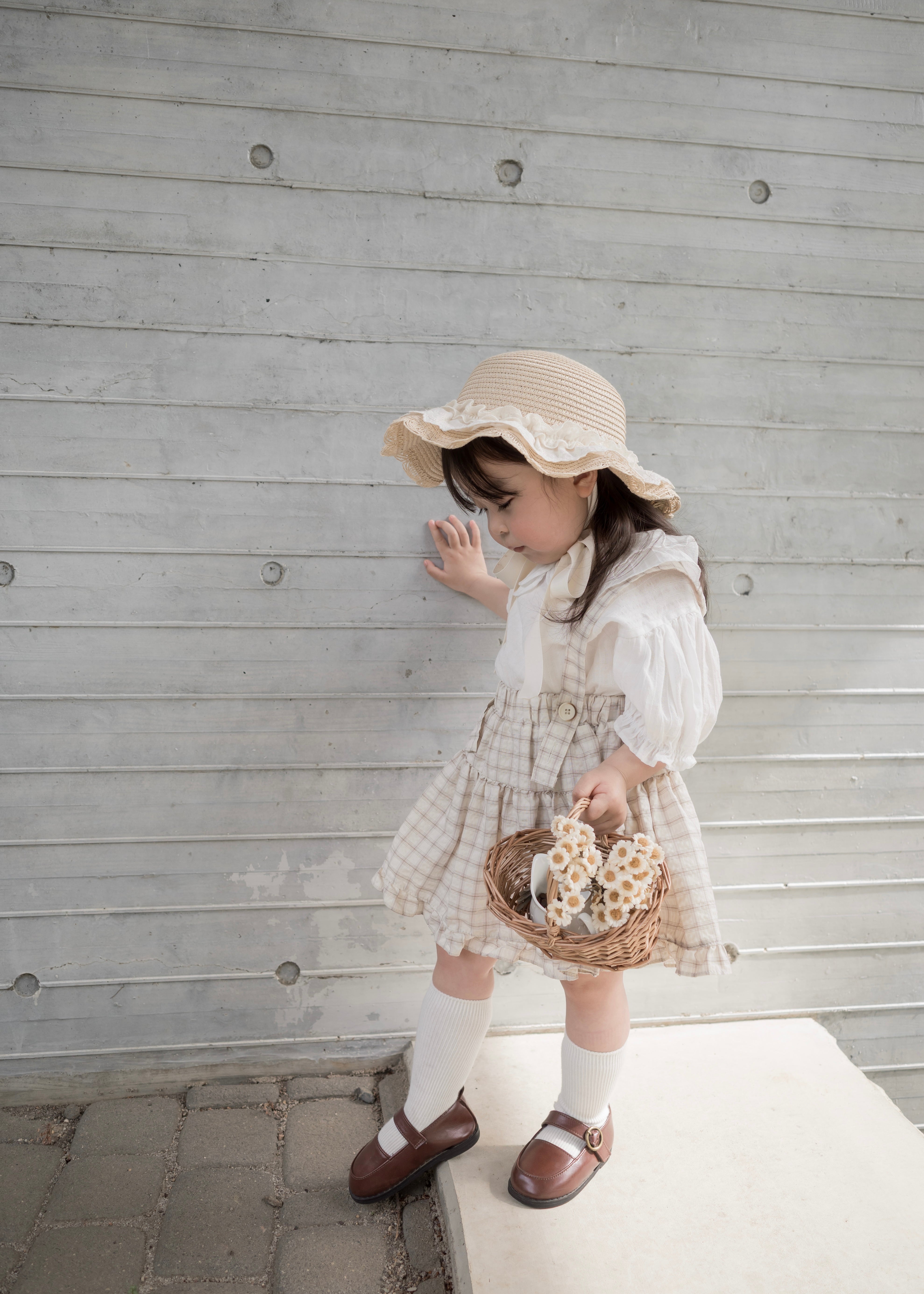 Pair check suspender skirt