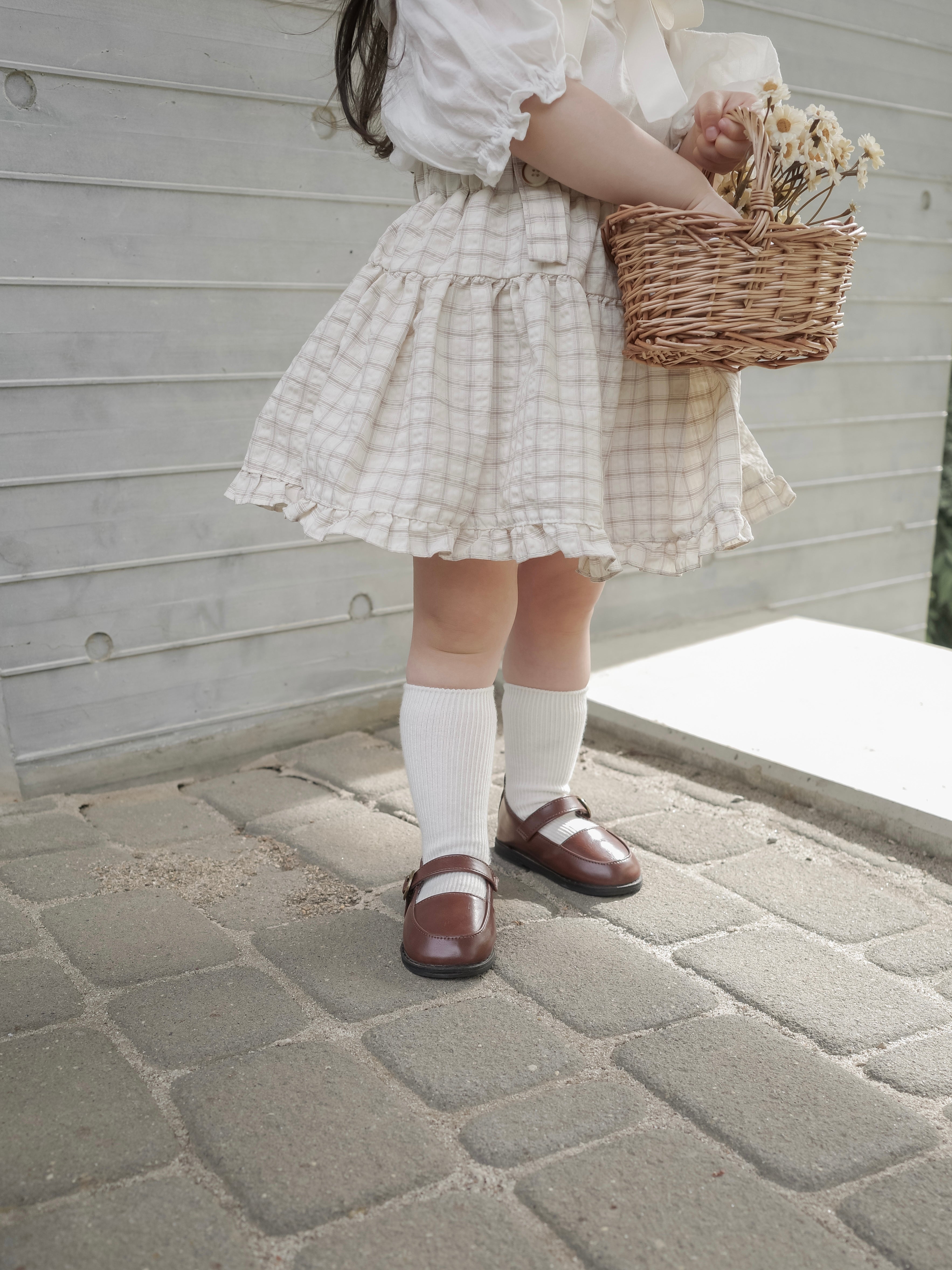 Pair check suspender skirt