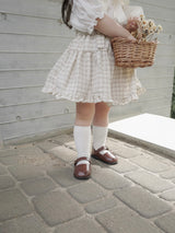 Pair check suspender skirt