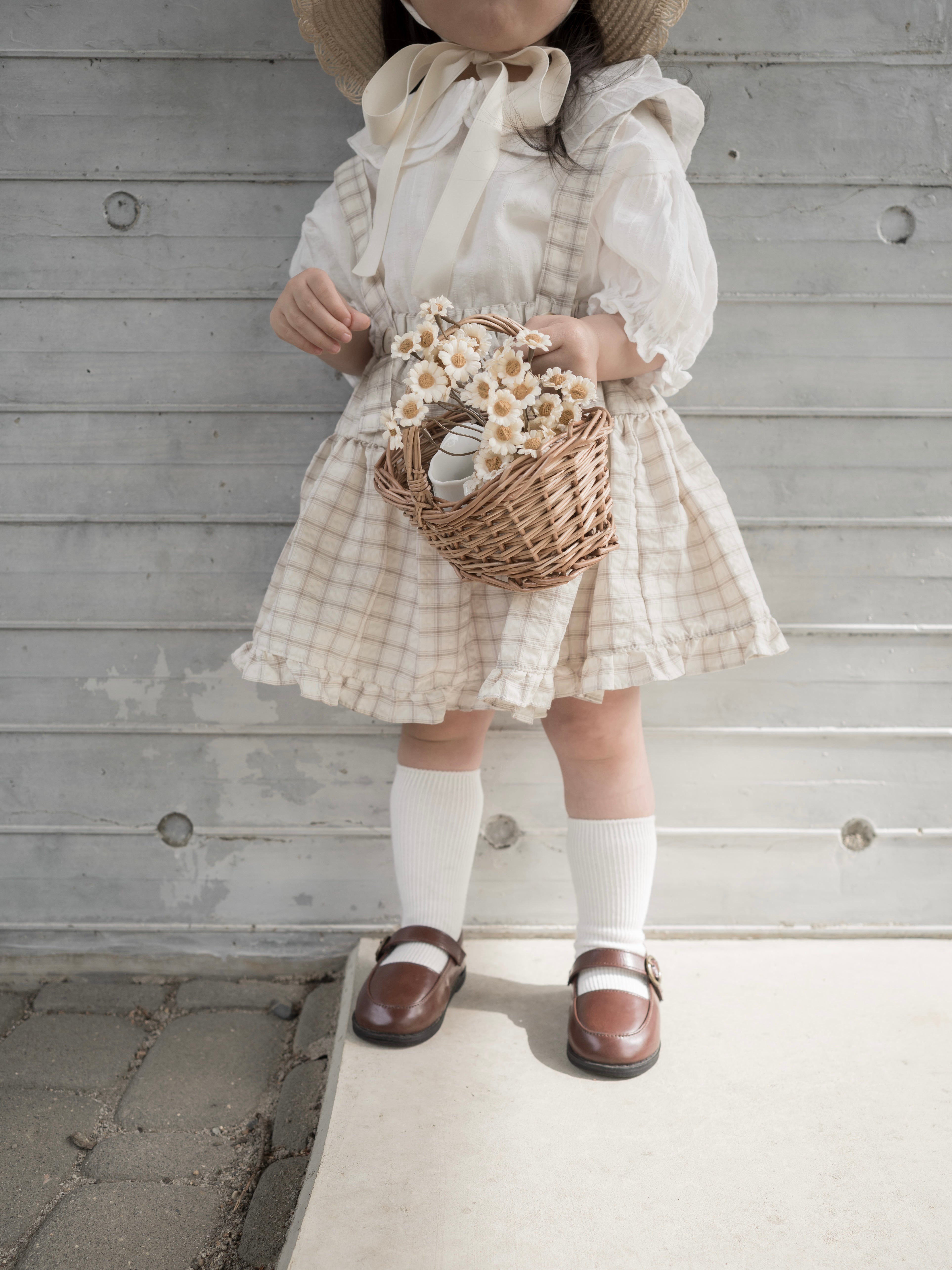 Pair check suspender skirt