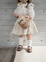 Pair check suspender skirt