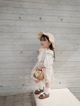 Pair check suspender skirt