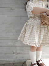 Pair check suspender skirt