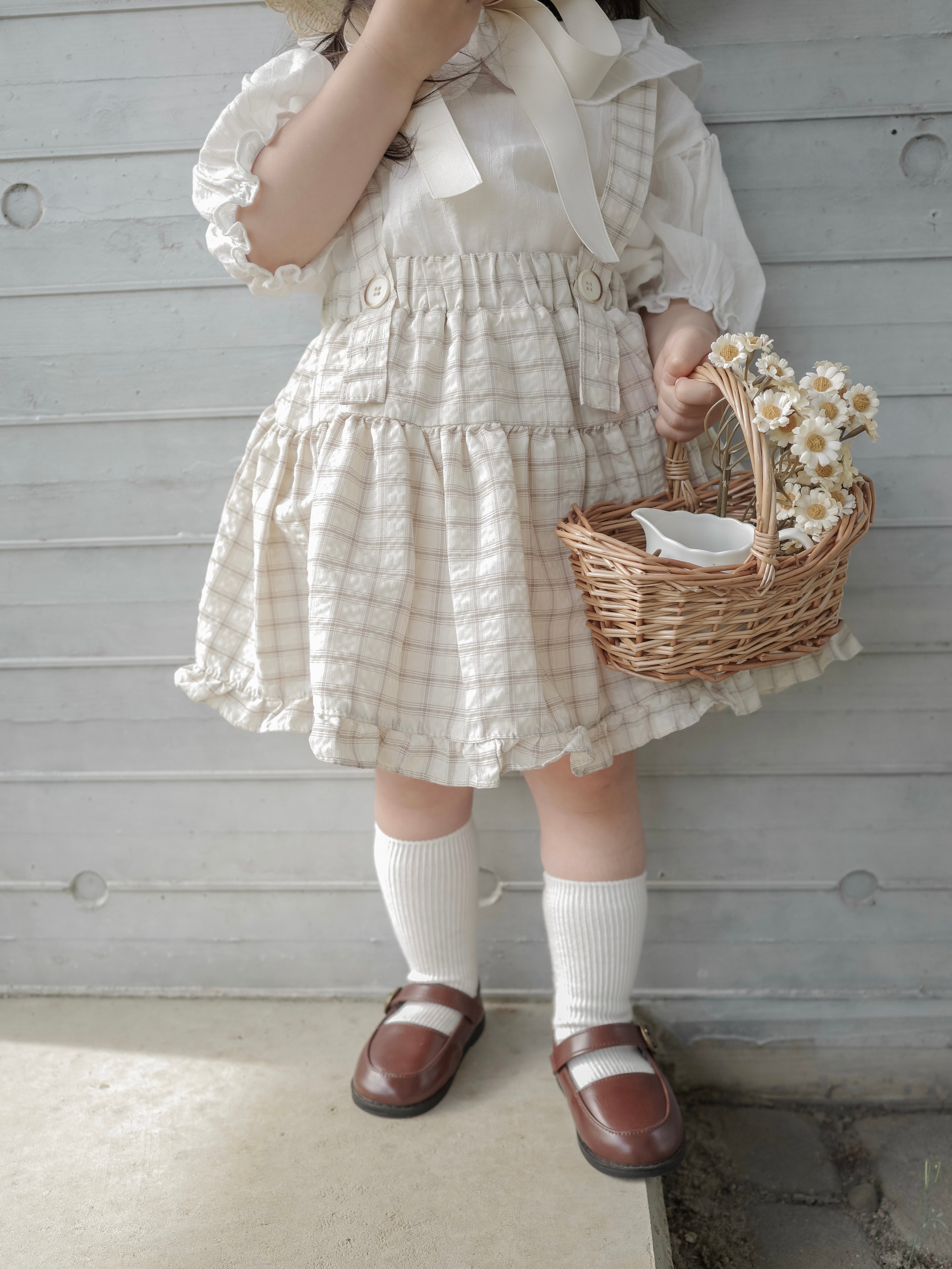 Pair check suspender skirt