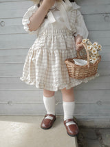Pair check suspender skirt
