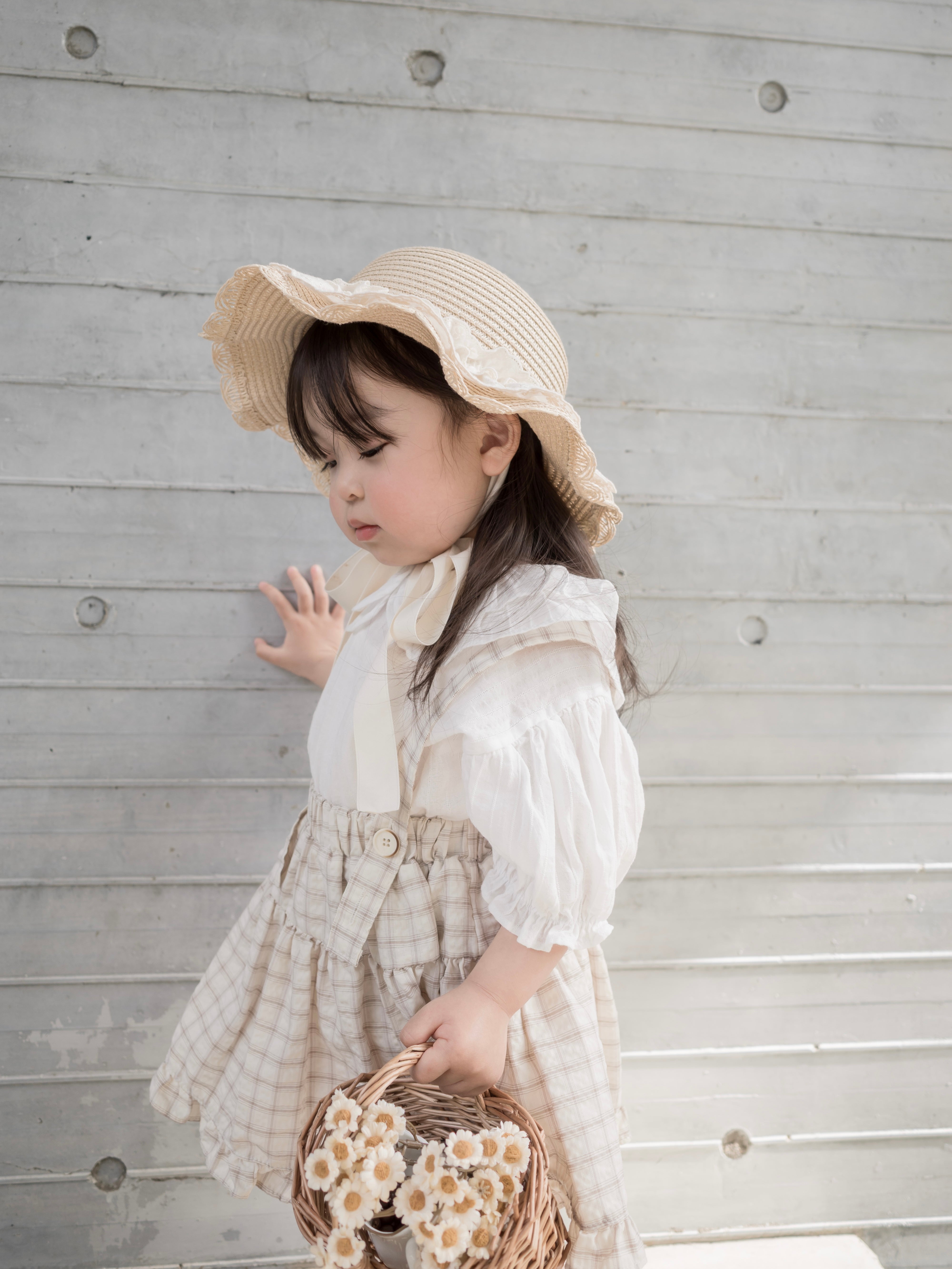 Pair check suspender skirt