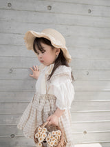 Pair check suspender skirt