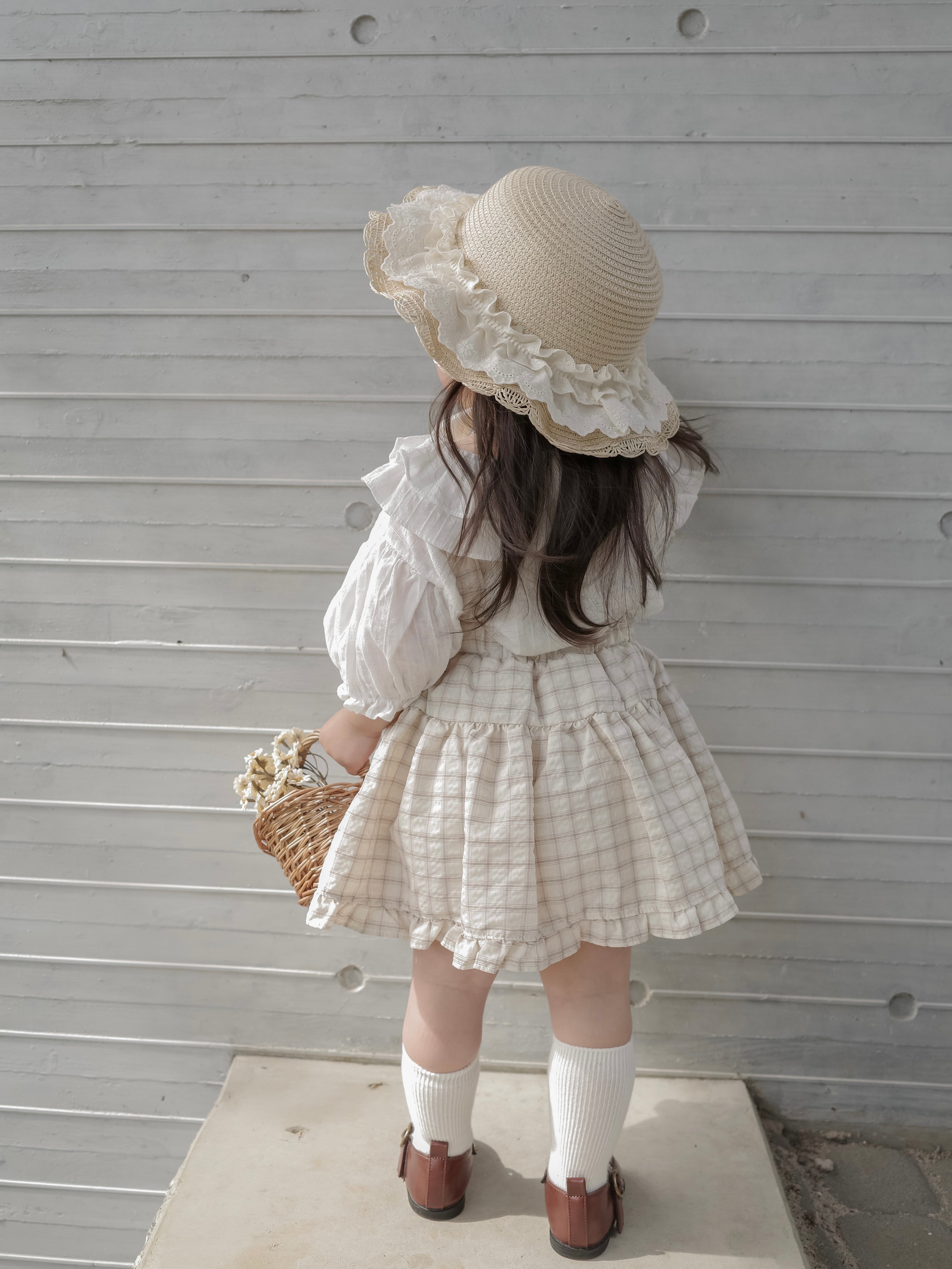 Pair check suspender skirt