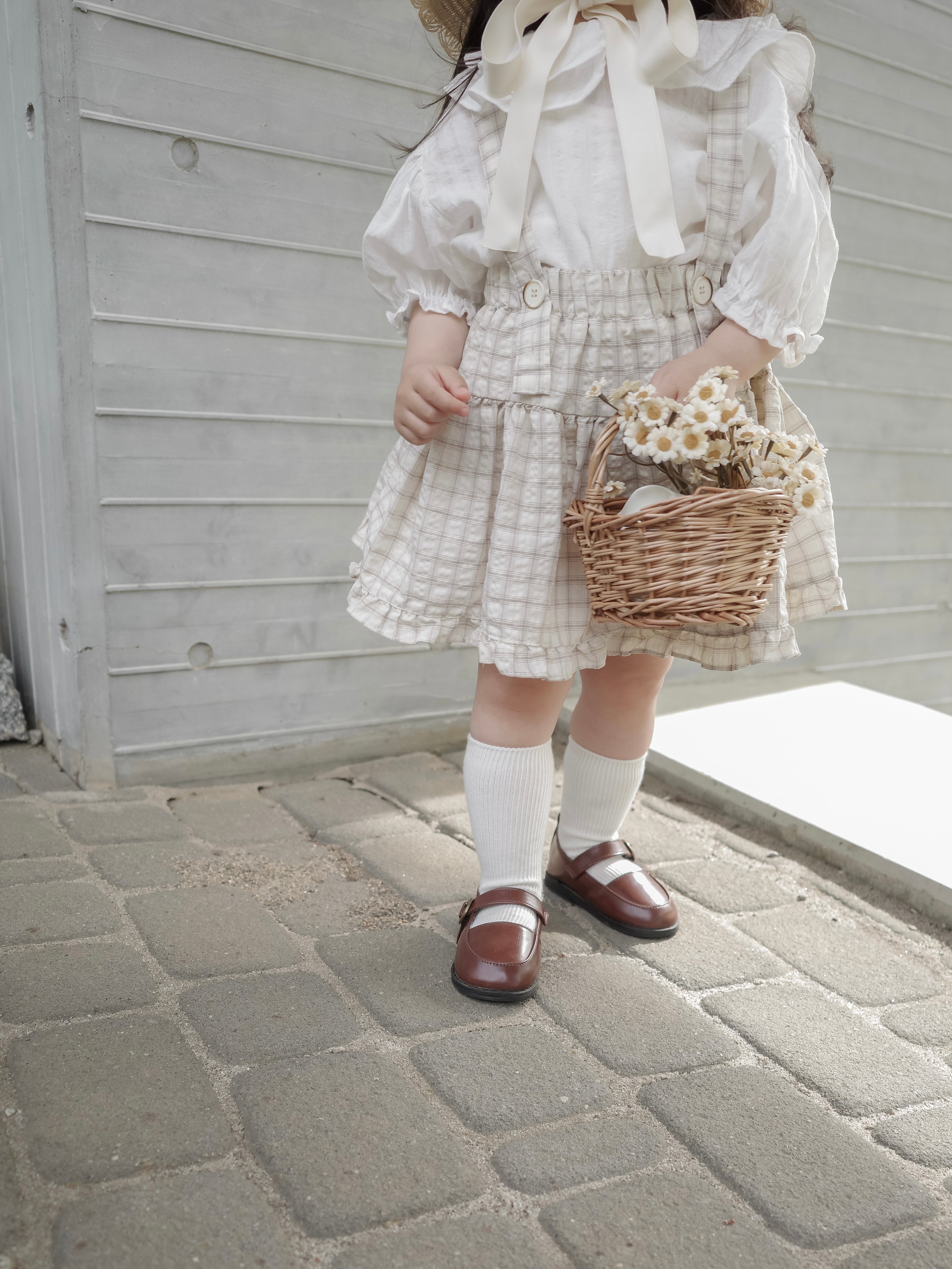 Pair check suspender skirt