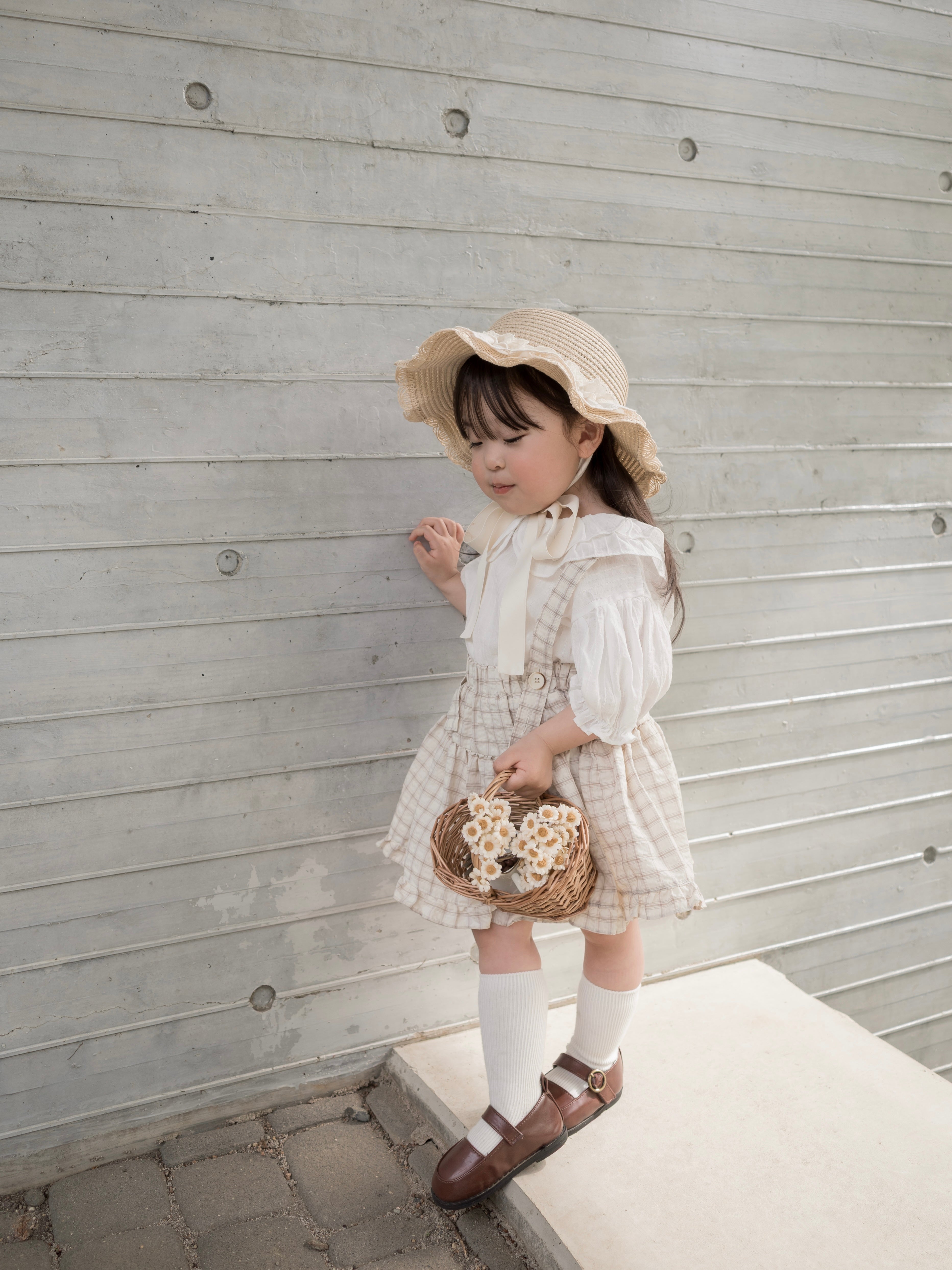 Pair check suspender skirt