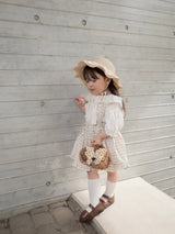 Pair check suspender skirt