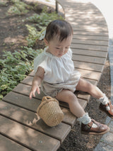 Prim sleeveless blouse
