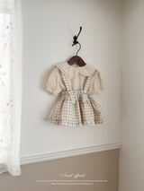 Pair check suspender skirt