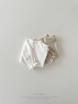 Eyelet lace puff tops