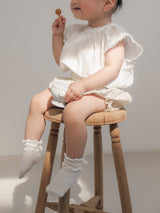 Prim sleeveless blouse