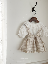 Pair check suspender skirt