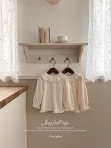 Joy frill tops